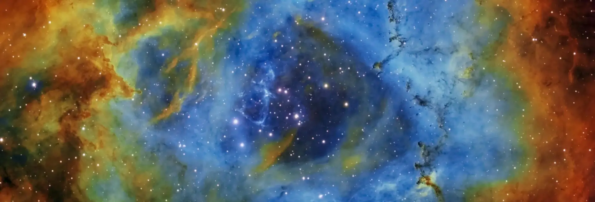Spirits Energy Post - Spirits Energy Inc. A vibrant nebula with bright stars and colorful gas clouds in deep space.